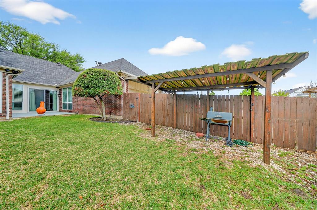 5618 Allen Lane Rowlett, TX 75088 - Photo 29 of 35 a view of a house with backyard and sitting area