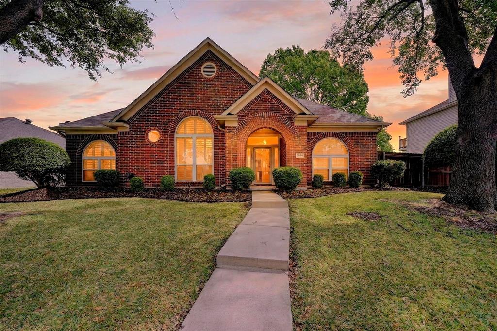 5618 Allen Lane Rowlett, TX 75088 - Photo 34 of 35 a front view of a house with a yard