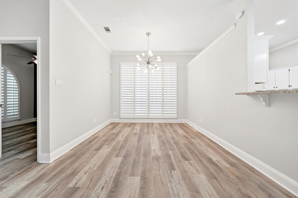 5618 Allen Lane Rowlett, TX 75088 - Photo 7 of 35 a view of empty room with wooden floor and fan
