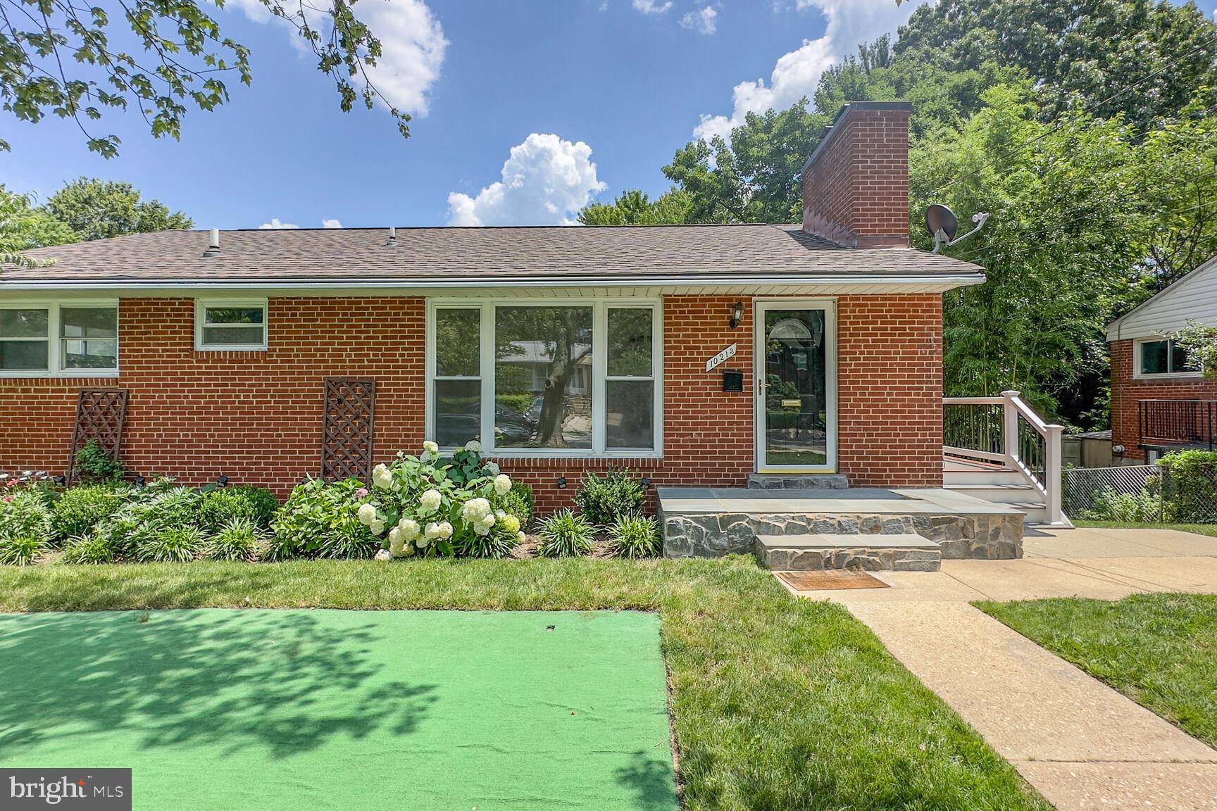 10213 Duvawn Place Silver Spring, MD 20902 - Photo 2 of 37 front view of a house with a yard