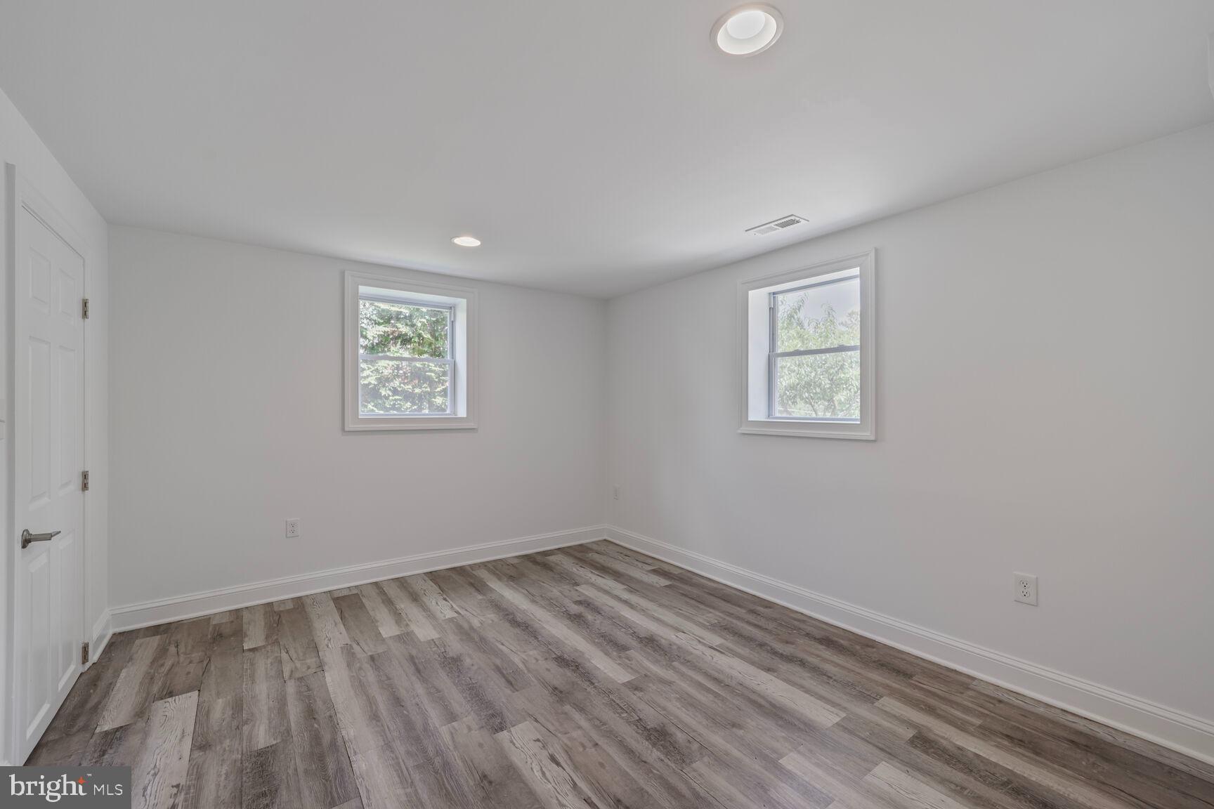 10213 Duvawn Place Silver Spring, MD 20902 - Photo 26 of 37 a view of room with window and hardwood floor