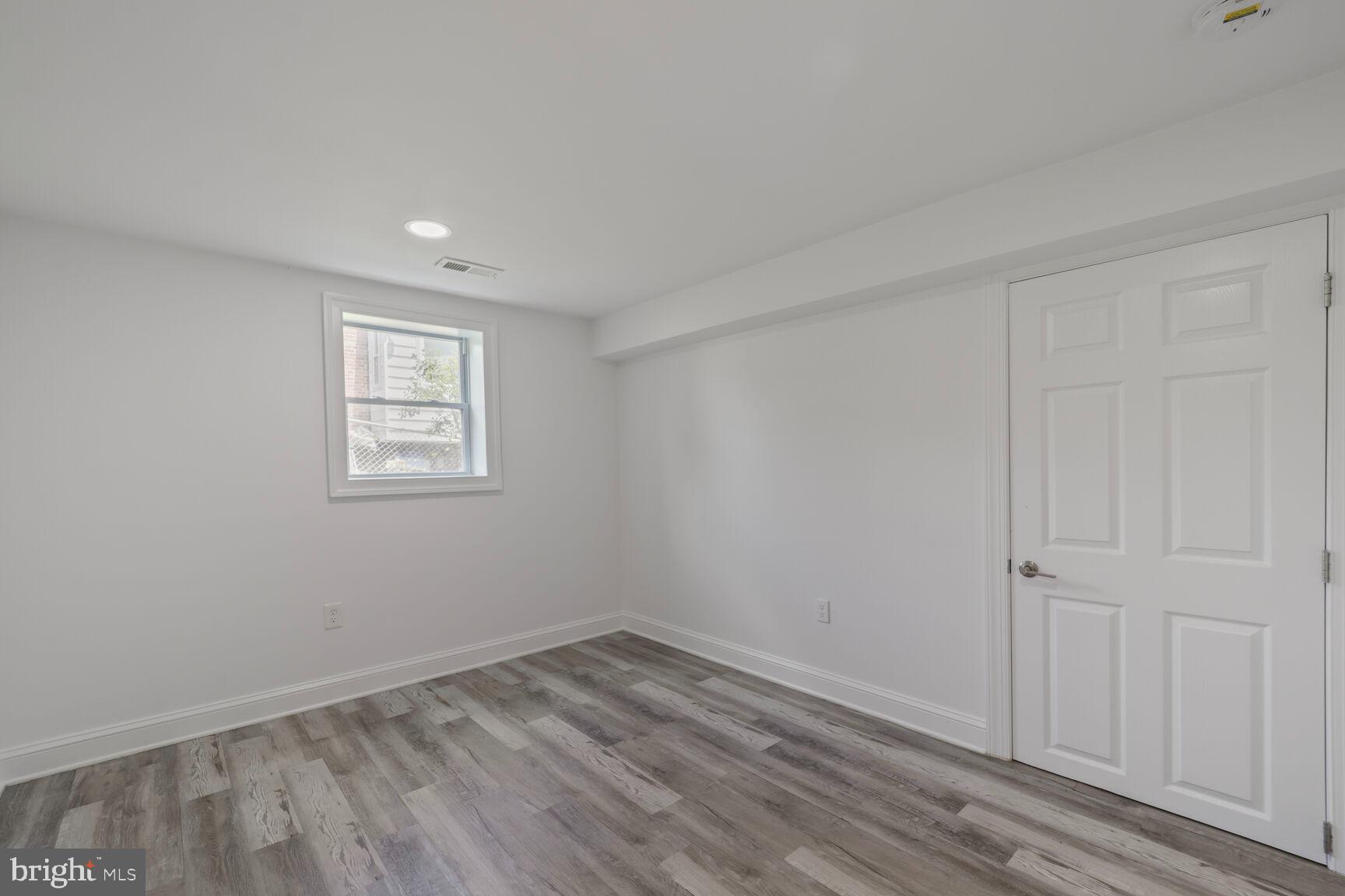 10213 Duvawn Place Silver Spring, MD 20902 - Photo 28 of 37 wooden floor in an empty room
