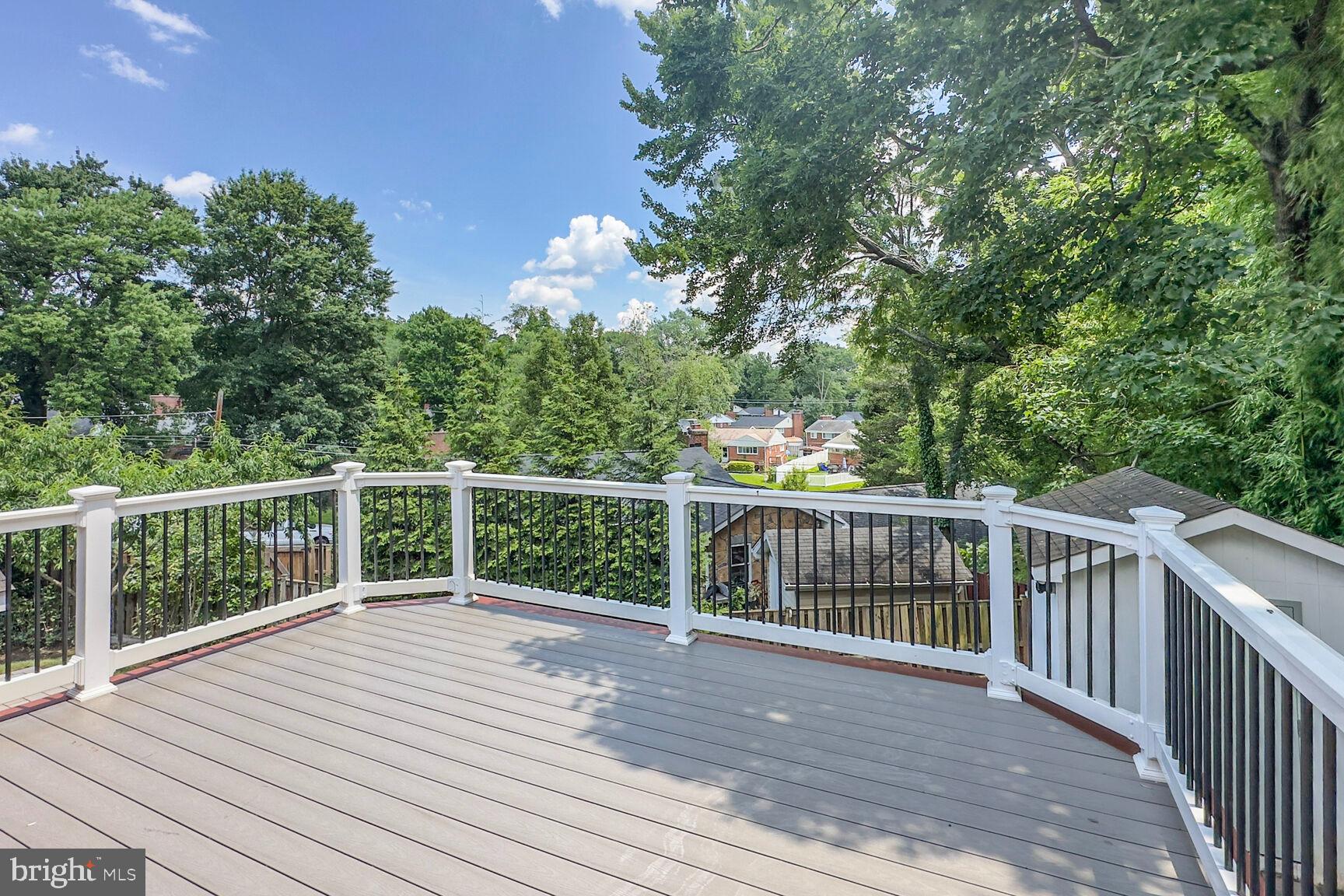 10213 Duvawn Place Silver Spring, MD 20902 - Photo 33 of 37 a view of a wooden roof deck