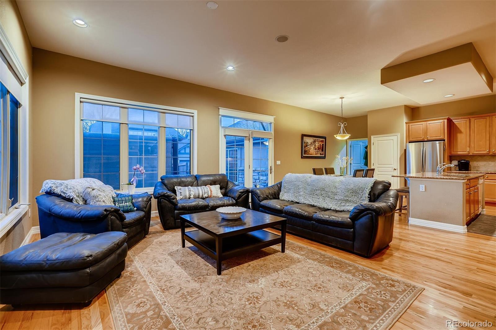 529 Uinta Way Denver, CO 80230 - Photo 11 of 40 a living room with furniture and a rug