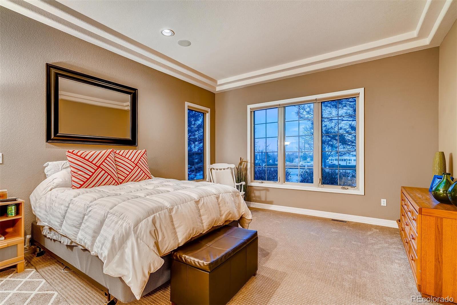 529 Uinta Way Denver, CO 80230 - Photo 15 of 40 a bedroom with a bed and a large window