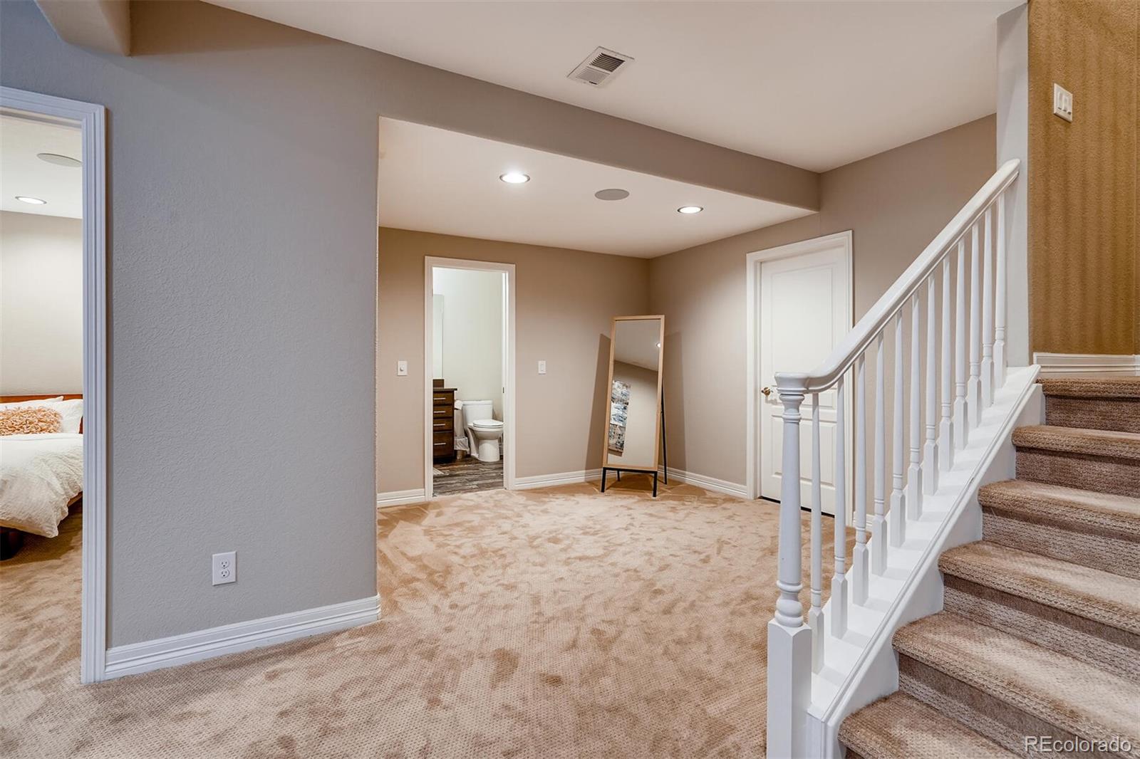 529 Uinta Way Denver, CO 80230 - Photo 22 of 40 a view of a hall with wooden floor and entryway