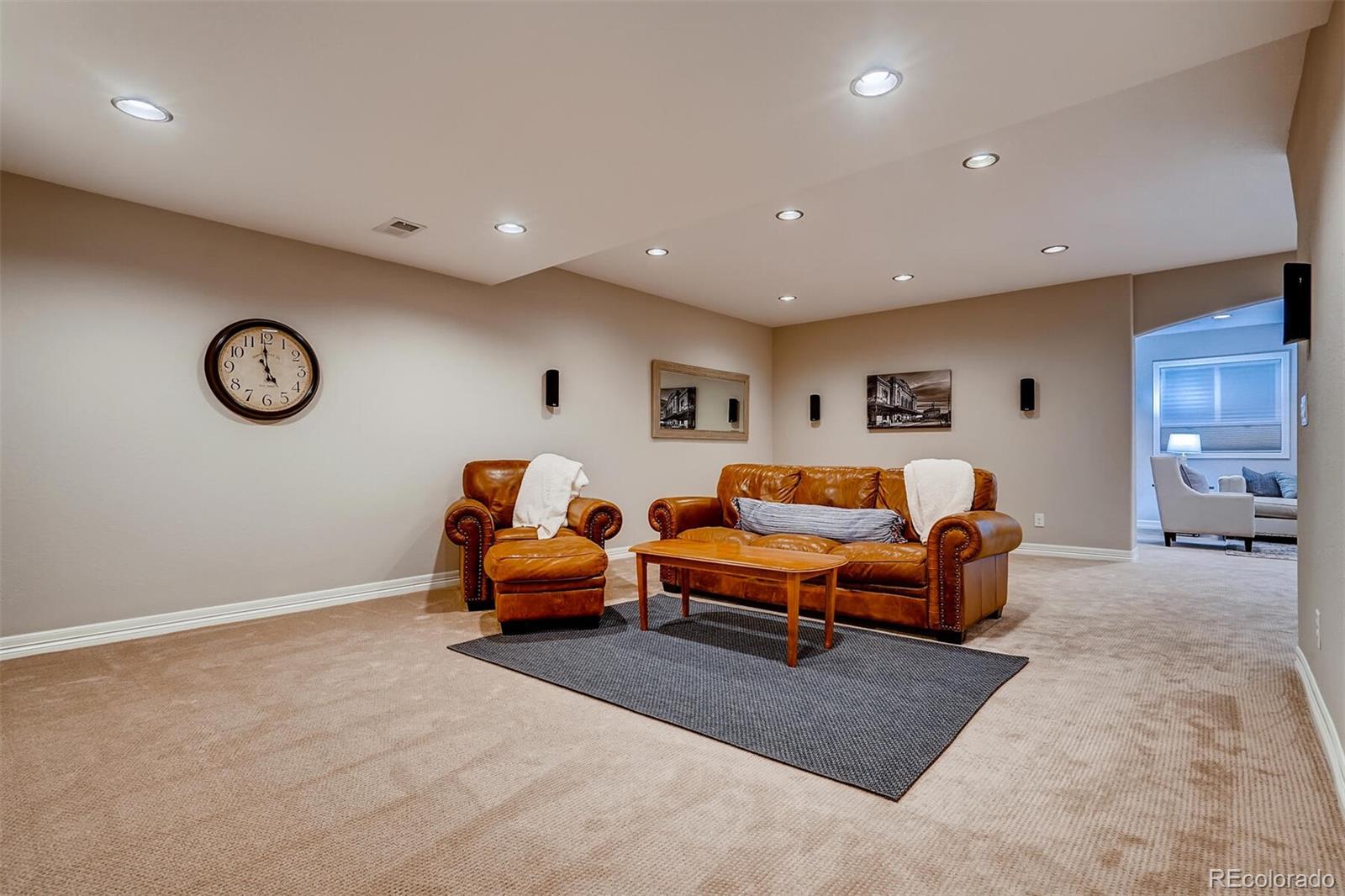 529 Uinta Way Denver, CO 80230 - Photo 25 of 40 a living room with furniture and a window