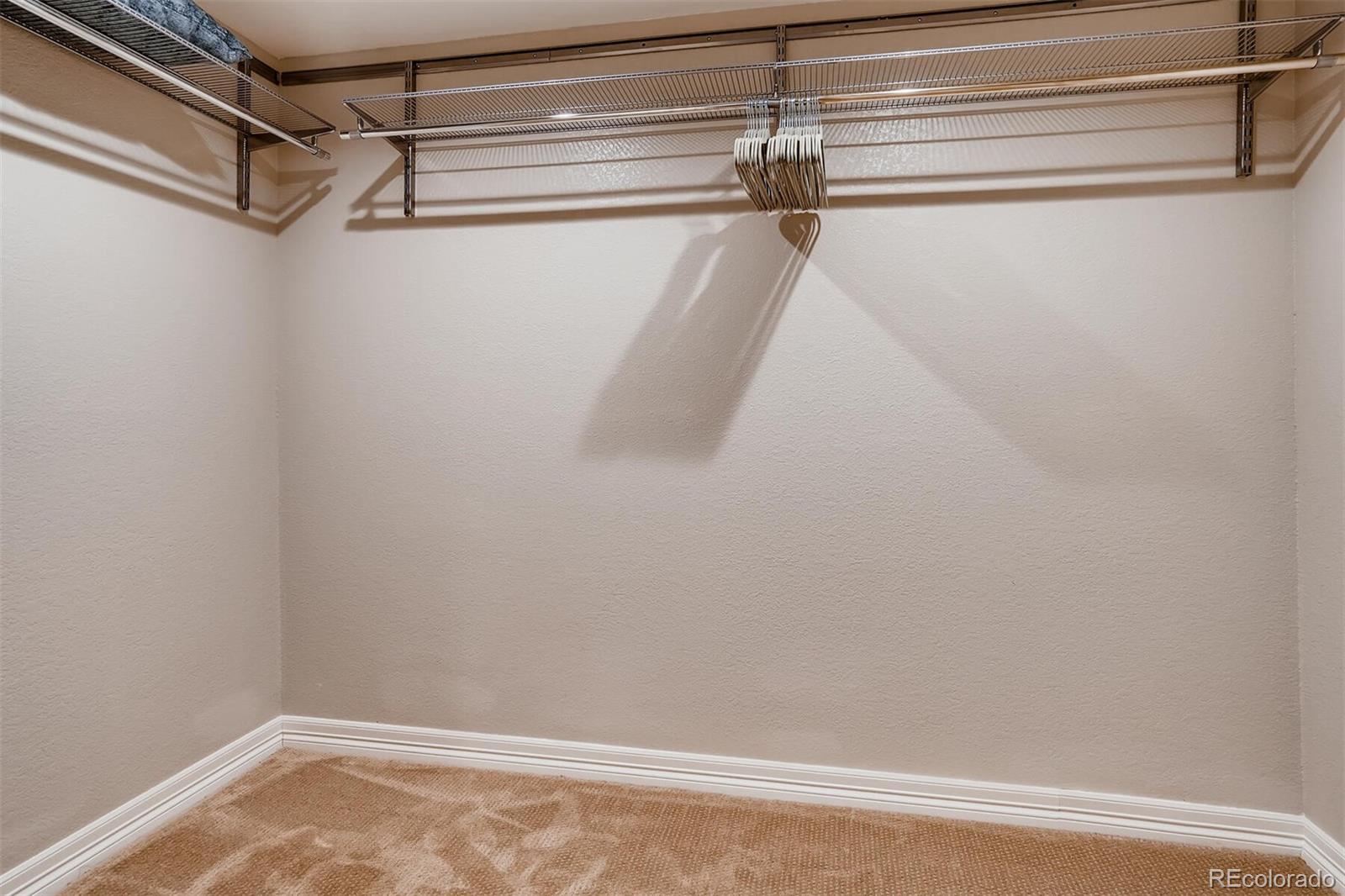 529 Uinta Way Denver, CO 80230 - Photo 36 of 40 a view of a room with racks on the wall