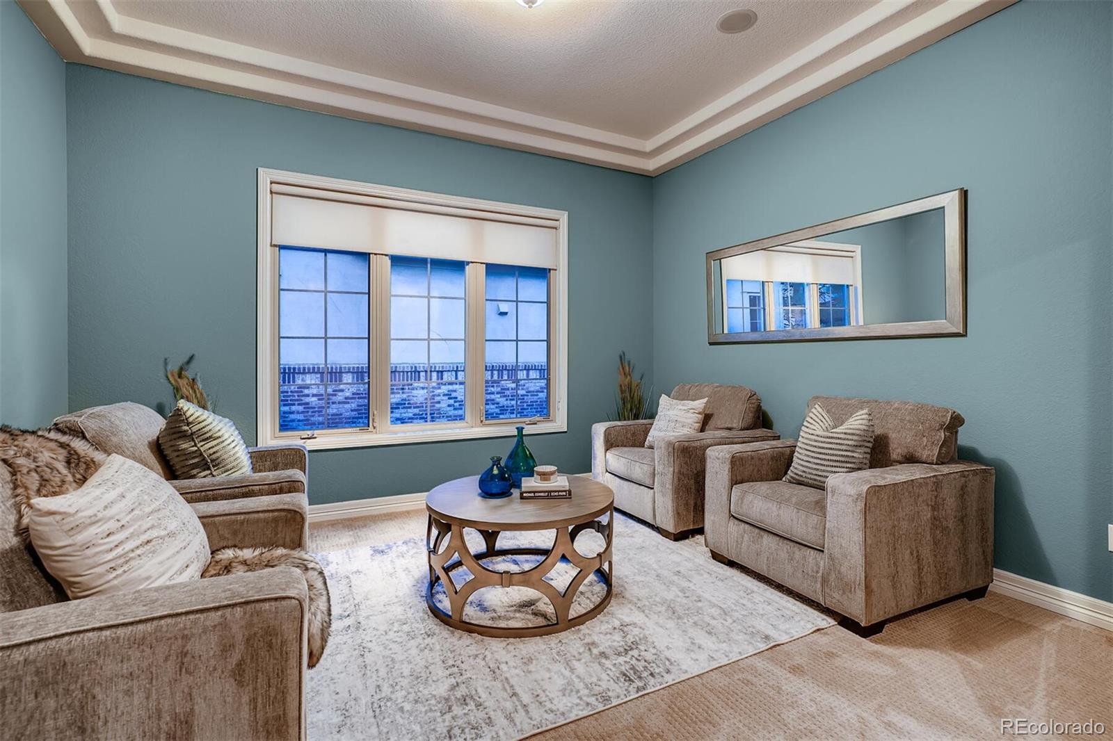 529 Uinta Way Denver, CO 80230 - Photo 4 of 40 a living room with furniture and a potted plant