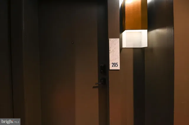 a view of a kitchen with a refrigerator