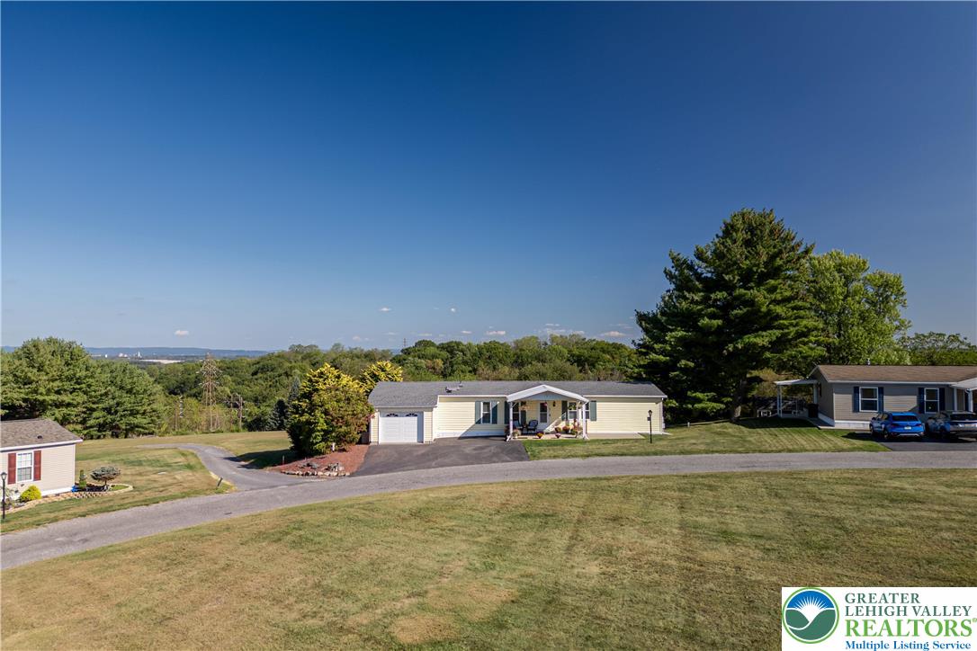 6149 Snyders Church Road, Unit TRL#28 Bath, PA 18014 - Photo 2 of 43 a view of a house with a yard