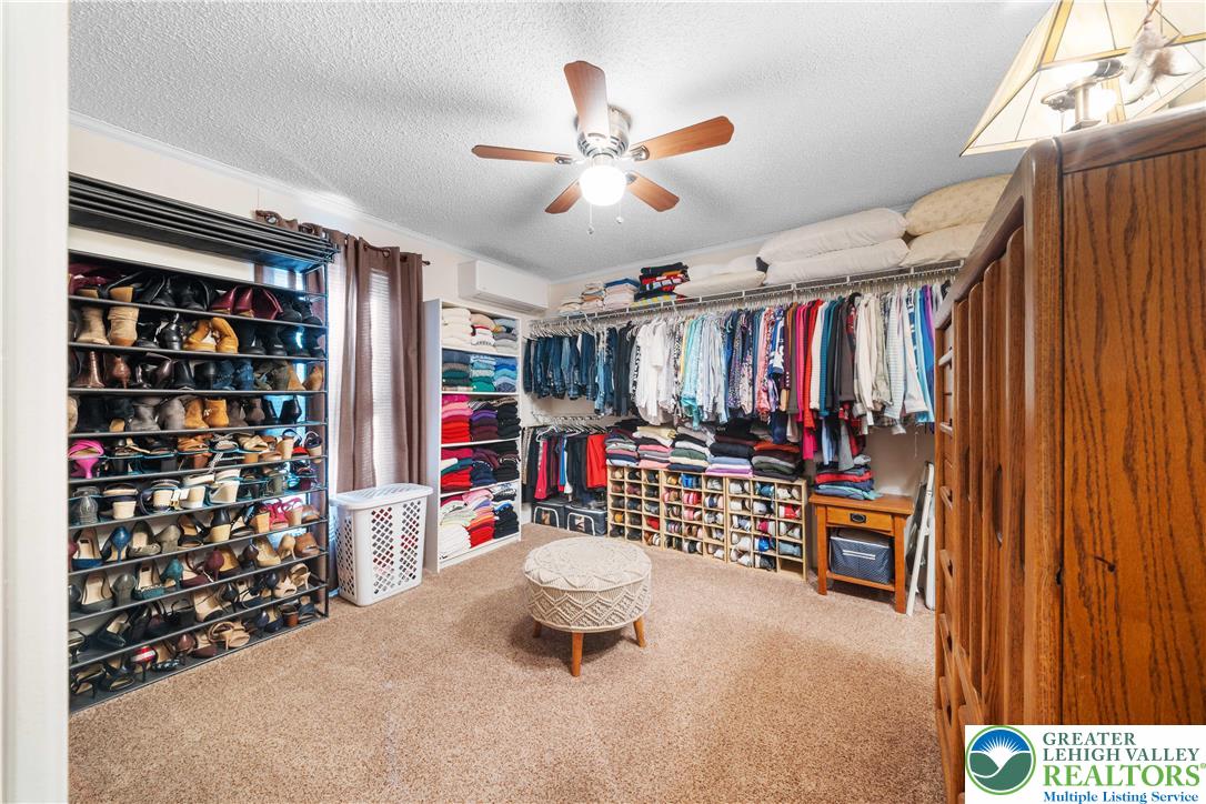 6149 Snyders Church Road, Unit TRL#28 Bath, PA 18014 - Photo 21 of 43 a living room with lots of furniture and white walls