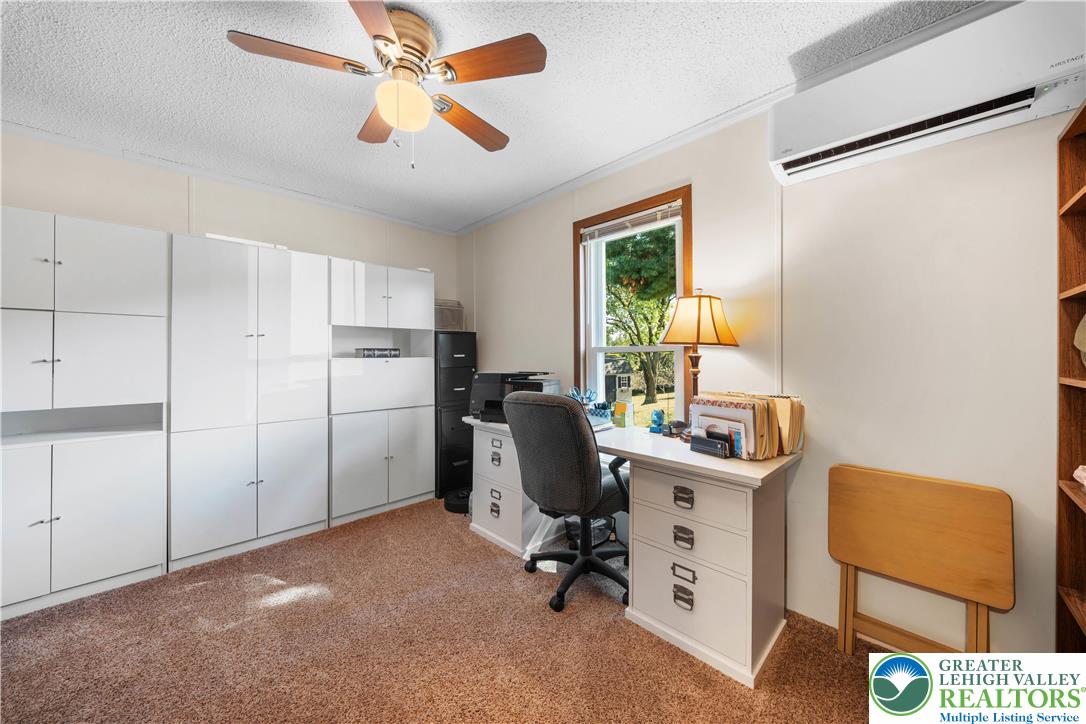 6149 Snyders Church Road, Unit TRL#28 Bath, PA 18014 - Photo 23 of 43 a view of a workspace with furniture and a window