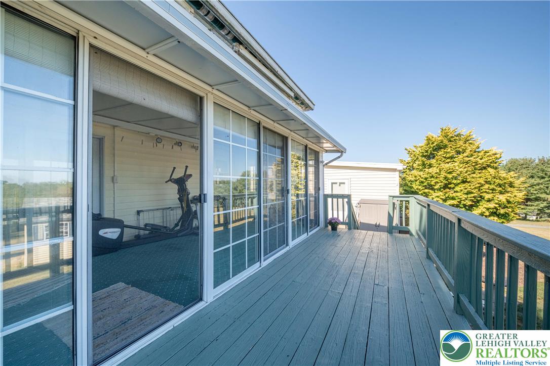 6149 Snyders Church Road, Unit TRL#28 Bath, PA 18014 - Photo 29 of 43 a balcony with wooden floor