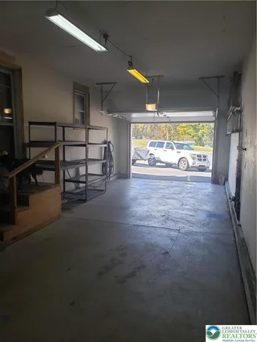 a kitchen with a sink a stove and a window
