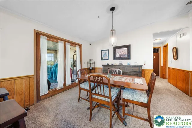 a view of a livingroom with furniture and window