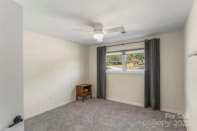 a utility room with cabinets dryer and washer