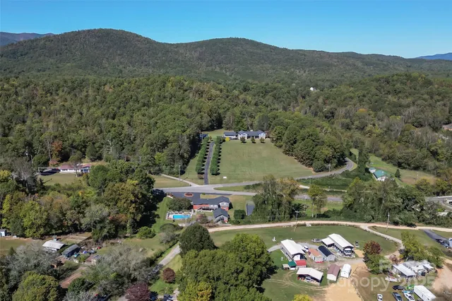 an aerial view of a house with a garden