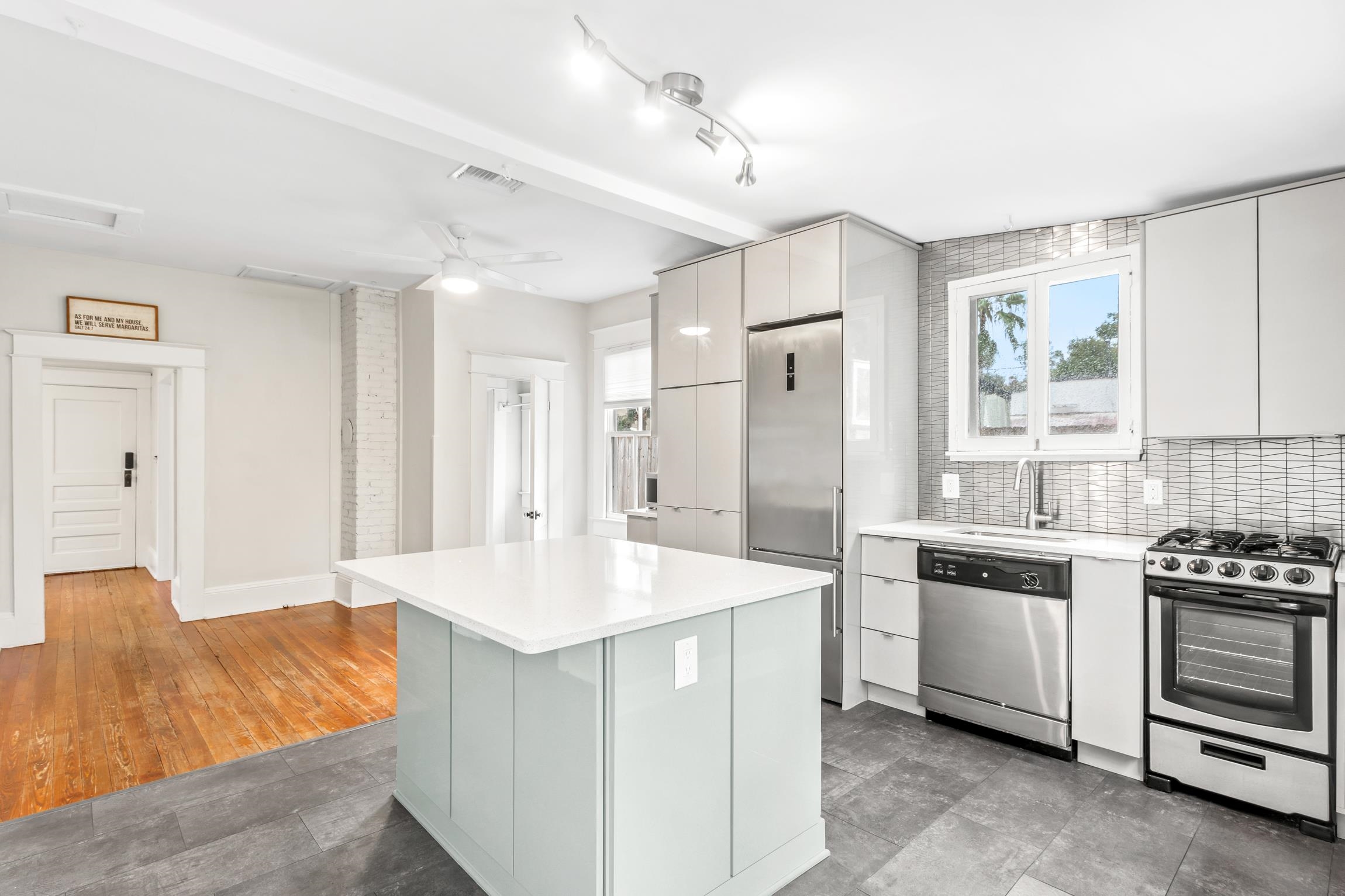 11 Hildreth Drive St. Augustine, FL 32084 - Photo 11 of 42 a kitchen with stainless steel appliances kitchen island granite countertop a sink and a refrigerator