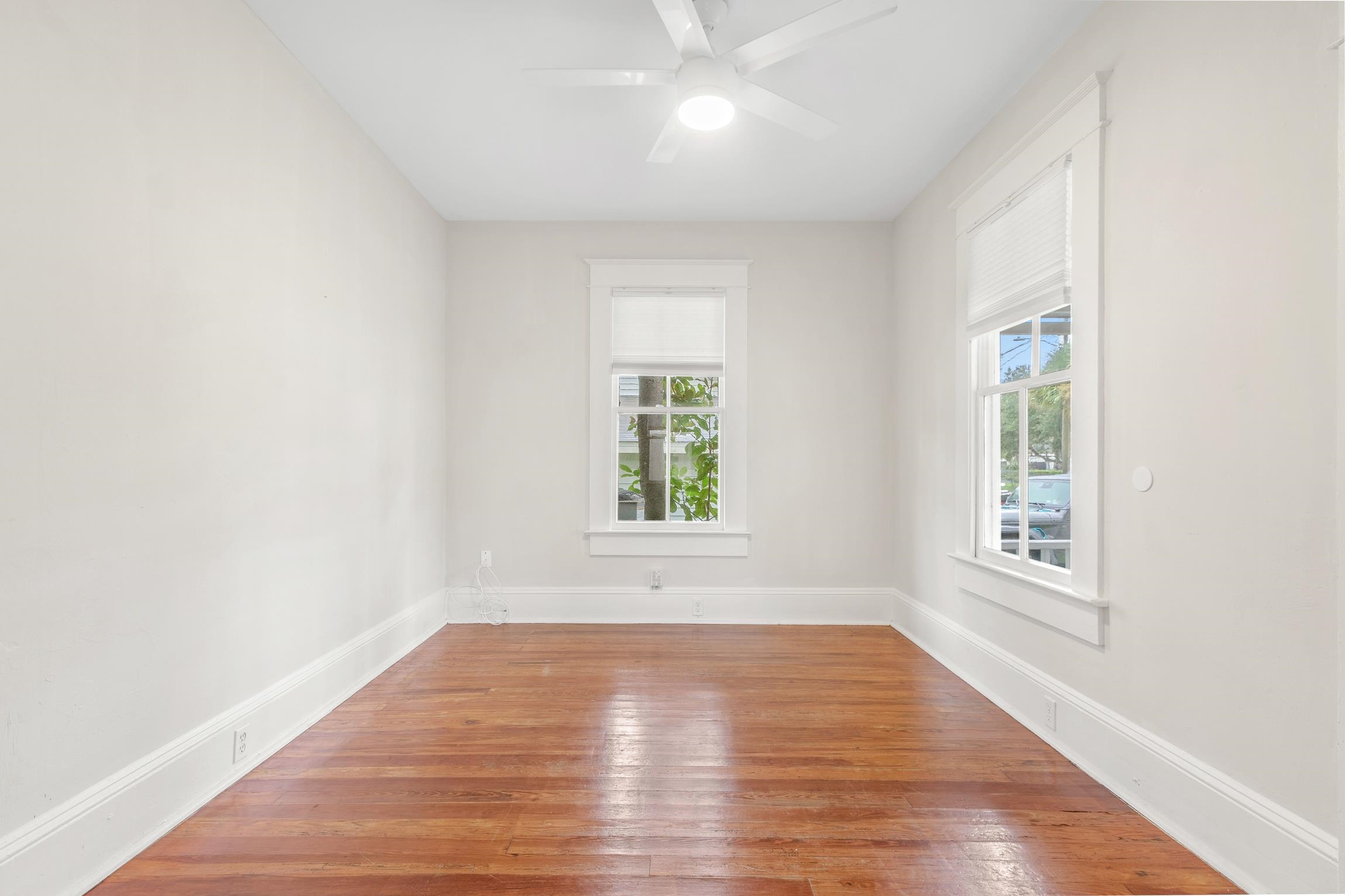 11 Hildreth Drive St. Augustine, FL 32084 - Photo 15 of 42 an empty room with wooden floor and windows