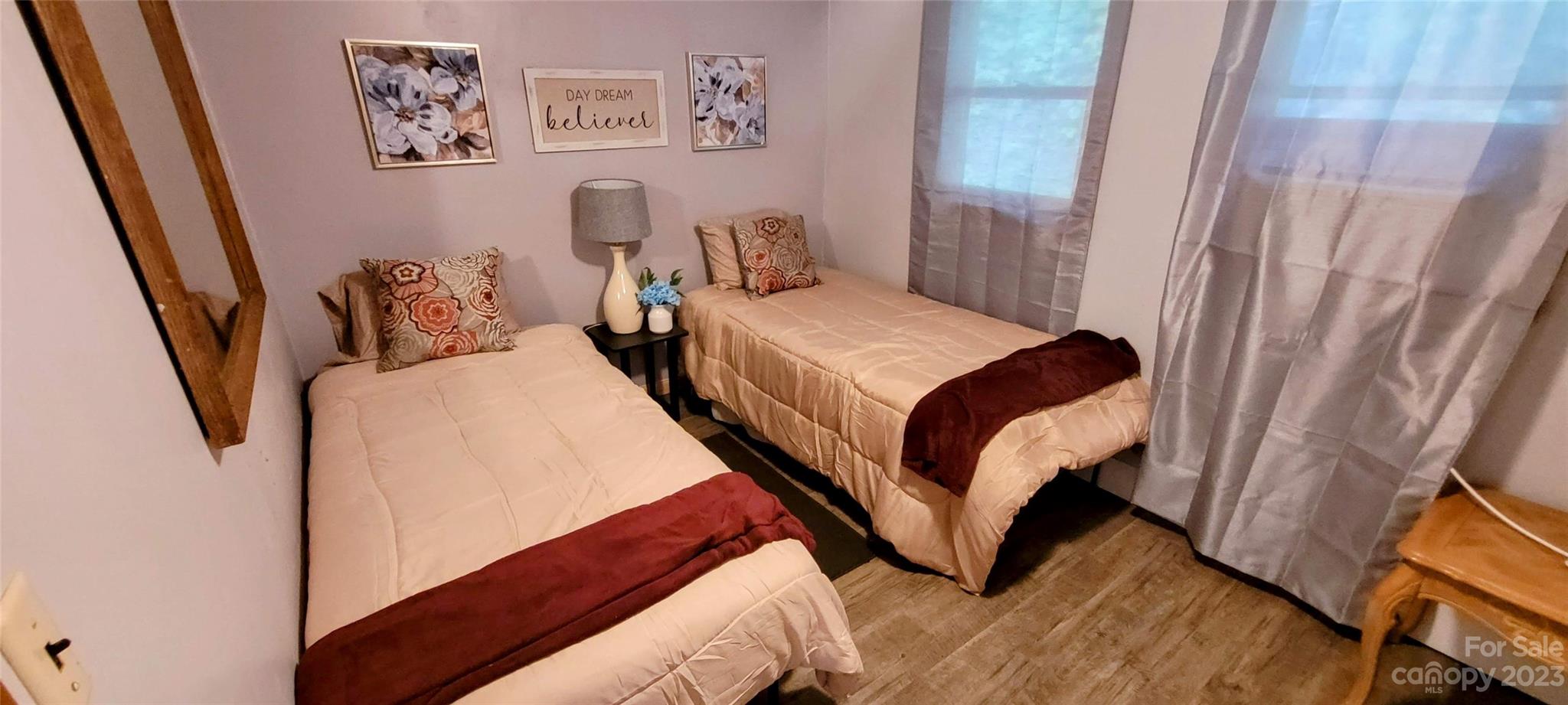 6115 Skyland Drive Sylva, NC 28779 - Photo 13 of 15 a bedroom with bed and a window