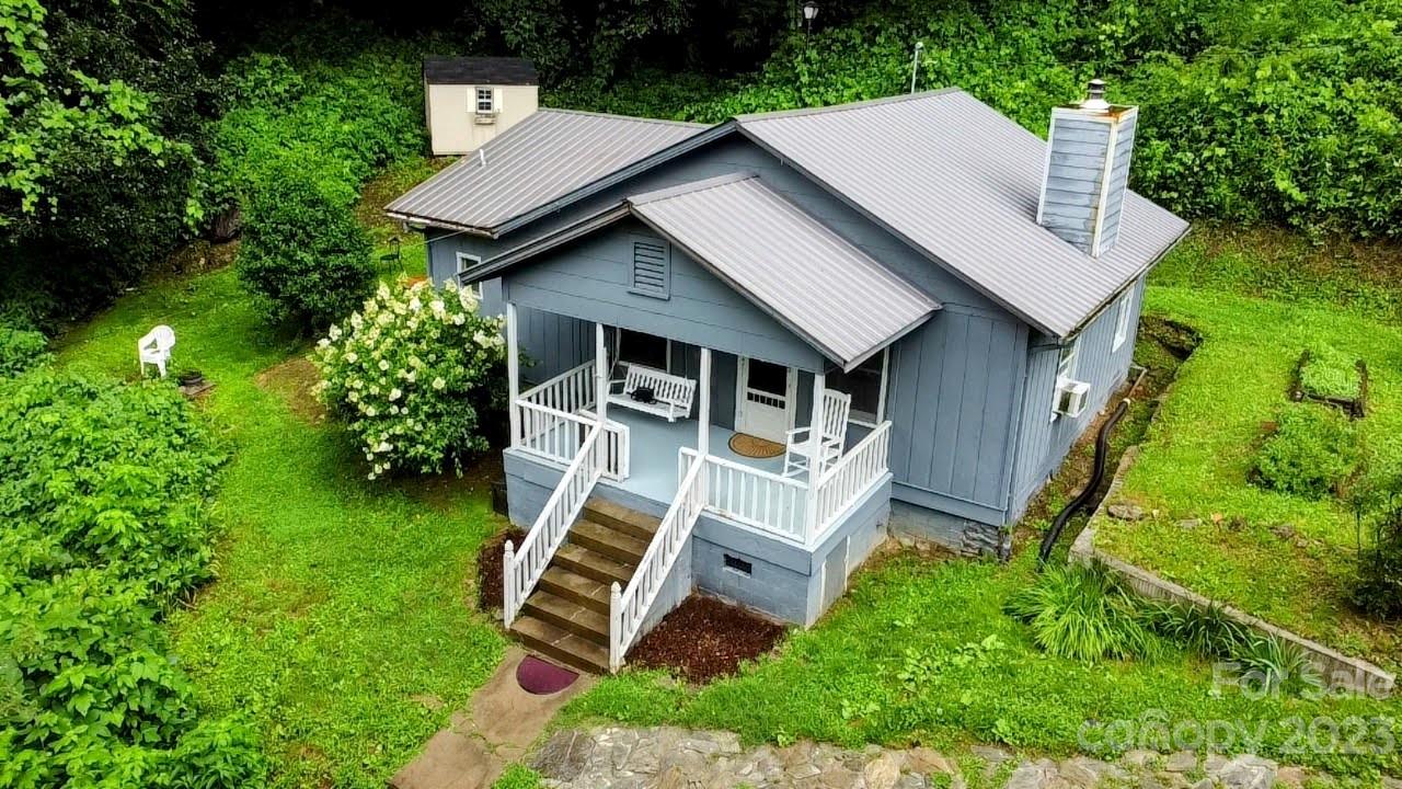 6115 Skyland Drive Sylva, NC 28779 - Photo 3 of 15 an aerial view of a house with backyard