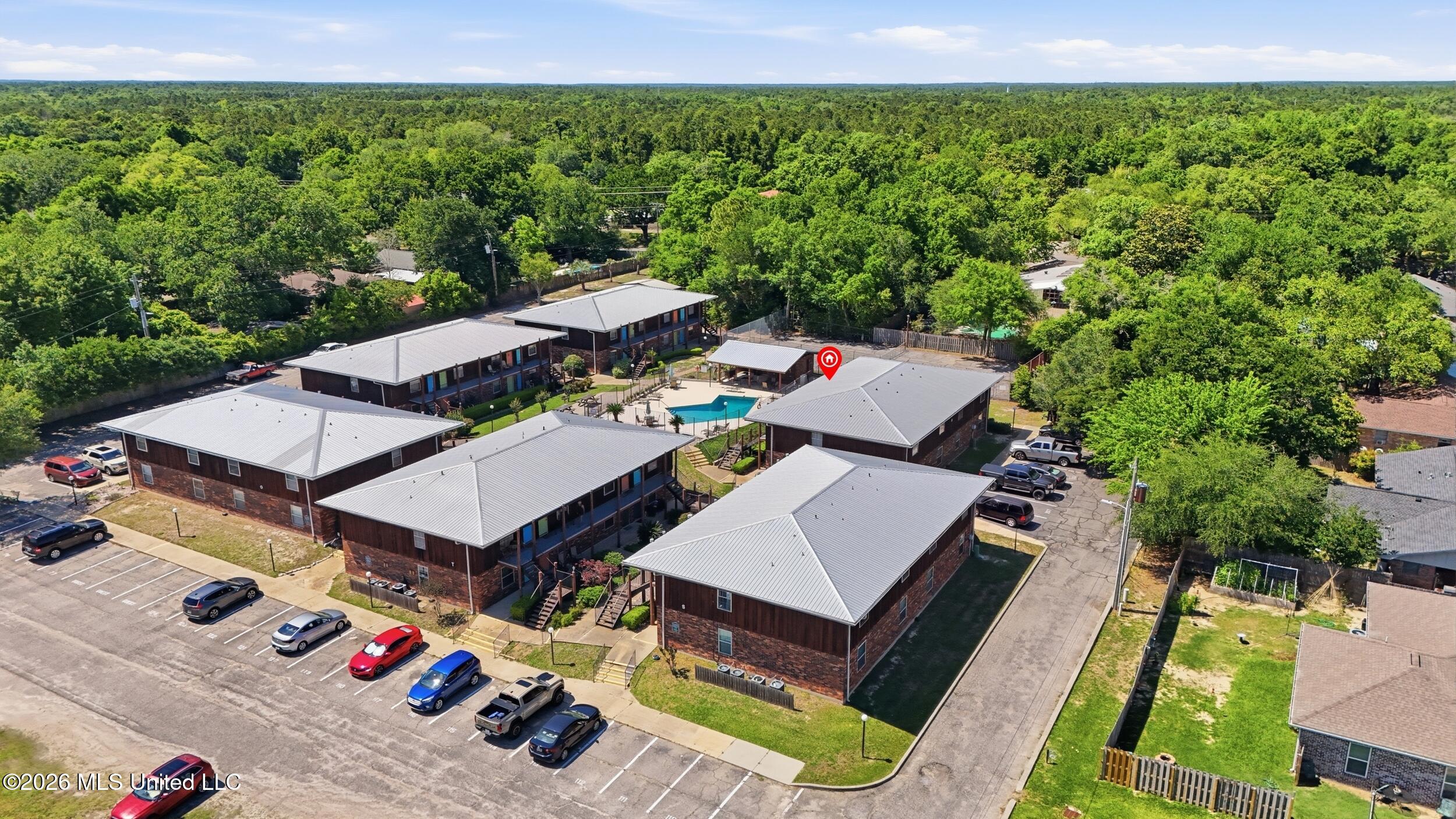1550 East 2nd Street, Unit R105 Pass Christian, MS 39571 - Photo 27 of 36 30_dji_20260504144730_0032_d_stamped_4c4