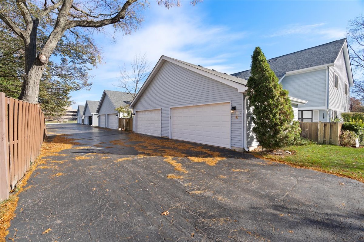 8 Hastings Lane Lincolnshire, IL 60069 - Photo 29 of 29 a view of a house with a yard and garage