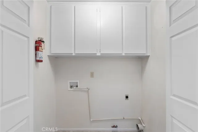 a view of room with cabinets