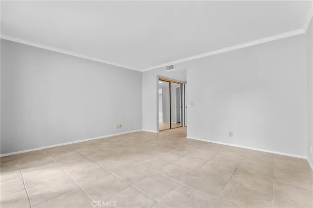 a view of living room with furniture and lamp