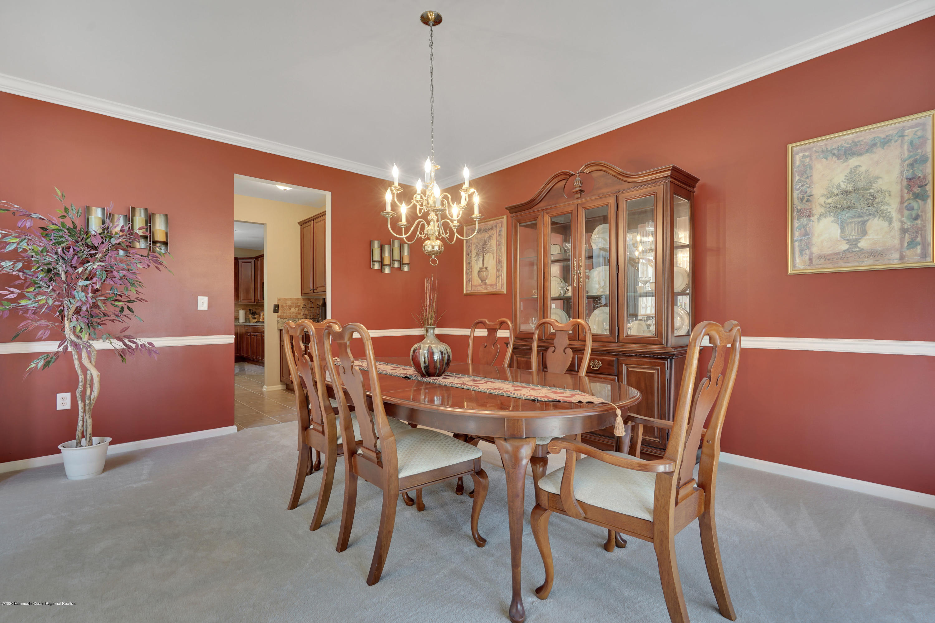 27 Northwoods Road Asbury Park, NJ 07712 - Photo 12 of 76 a view of a dining room with furniture and chandelier