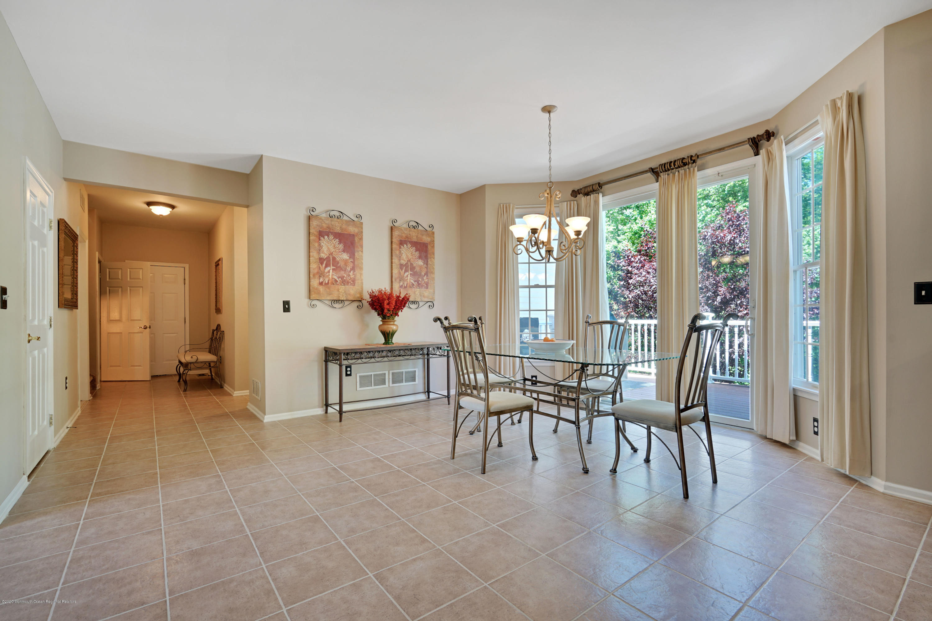 27 Northwoods Road Asbury Park, NJ 07712 - Photo 24 of 76 a view of a livingroom with furniture and window
