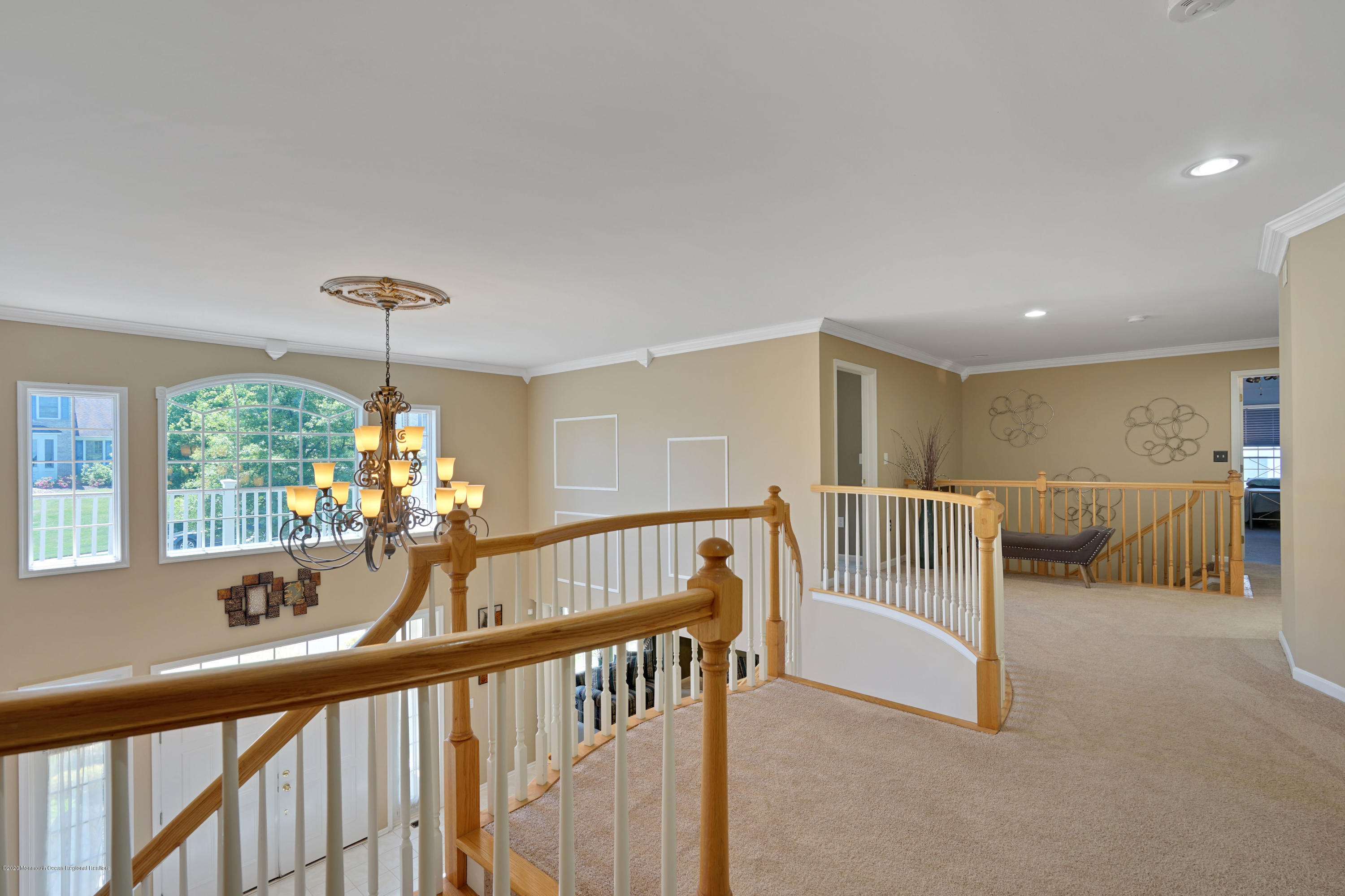 27 Northwoods Road Asbury Park, NJ 07712 - Photo 32 of 76 a view of staircase and living room with windows