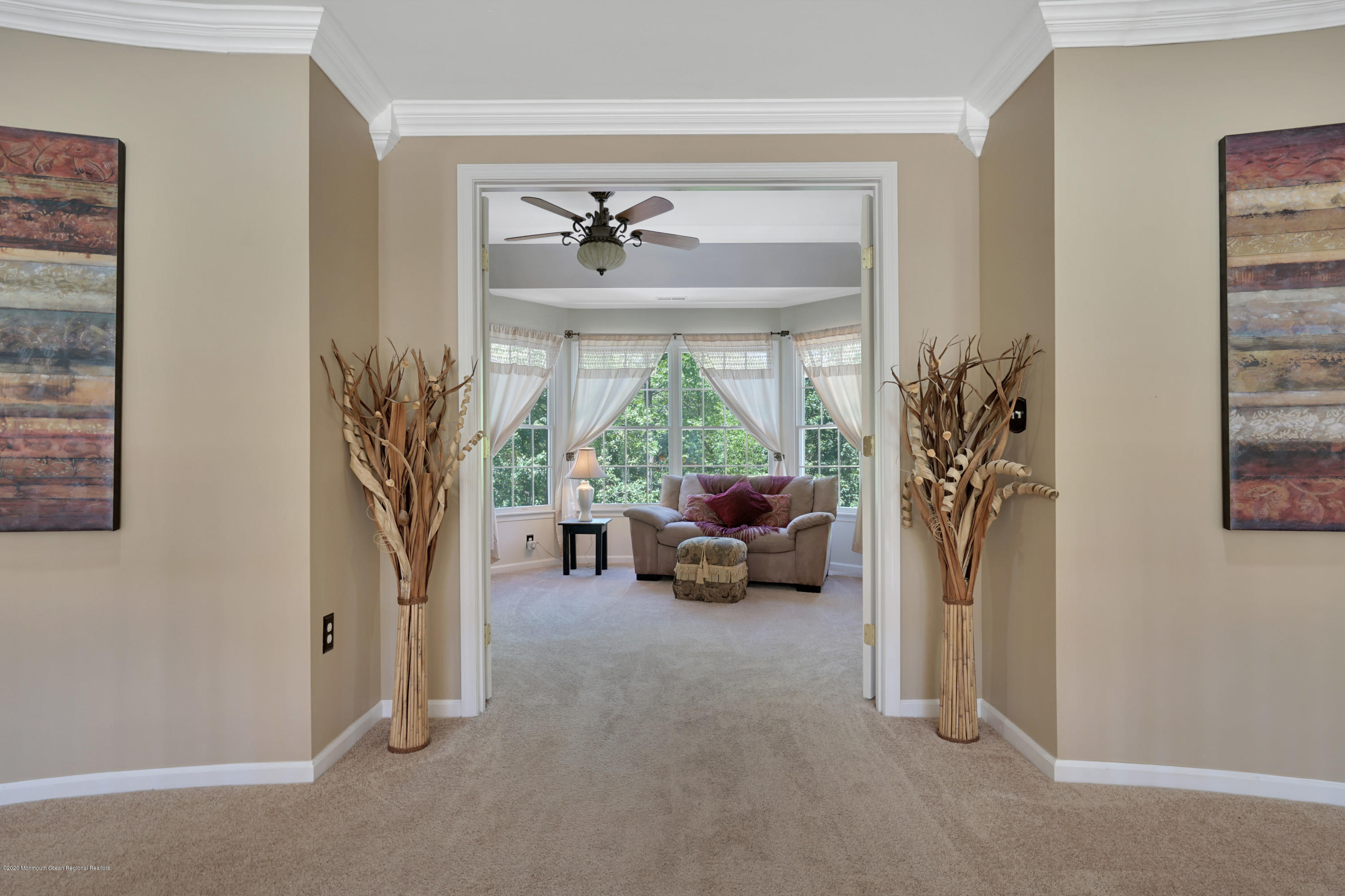 27 Northwoods Road Asbury Park, NJ 07712 - Photo 34 of 76 a living room with furniture and a potted plant