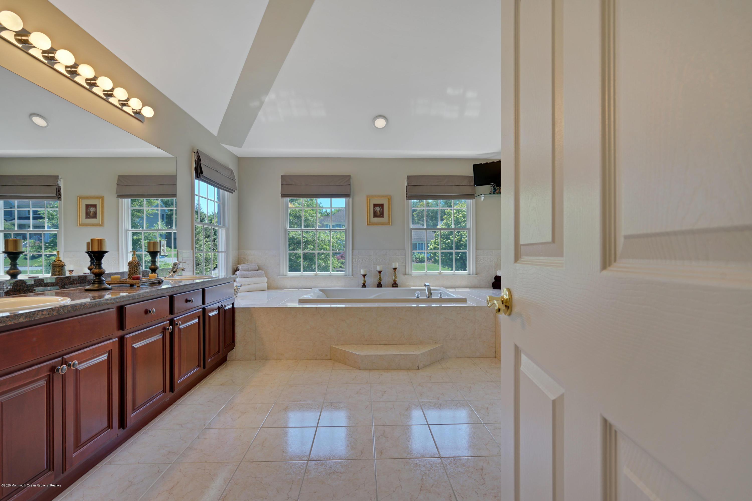 27 Northwoods Road Asbury Park, NJ 07712 - Photo 41 of 76 a large bathroom with a large tub and sink