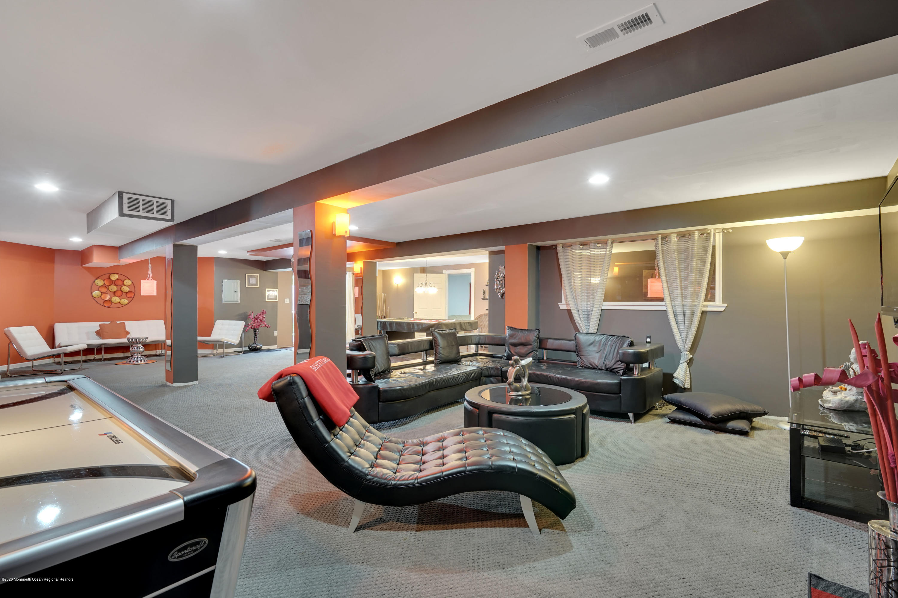27 Northwoods Road Asbury Park, NJ 07712 - Photo 61 of 76 a lobby with furniture and floor to ceiling window