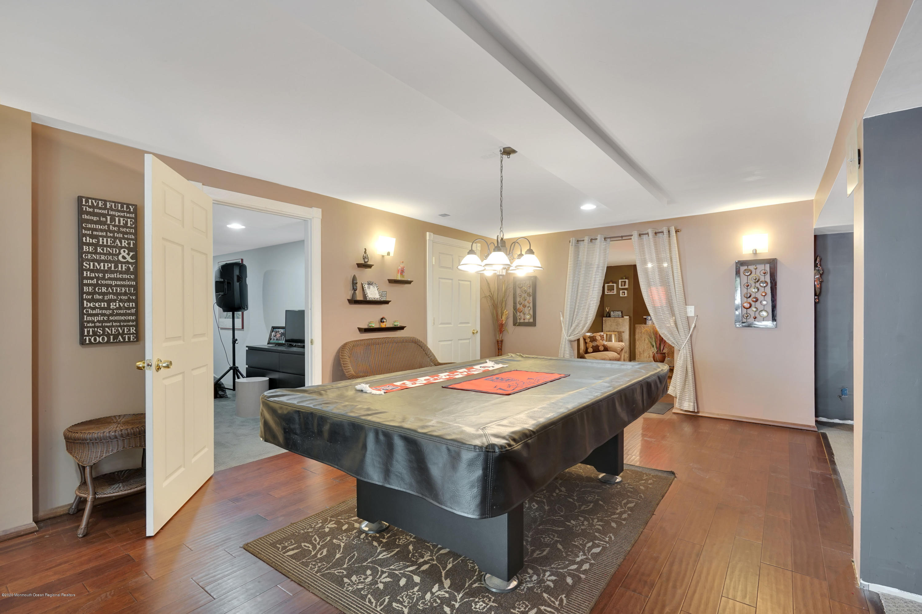 27 Northwoods Road Asbury Park, NJ 07712 - Photo 65 of 76 a view of a dining room with furniture and wooden floor