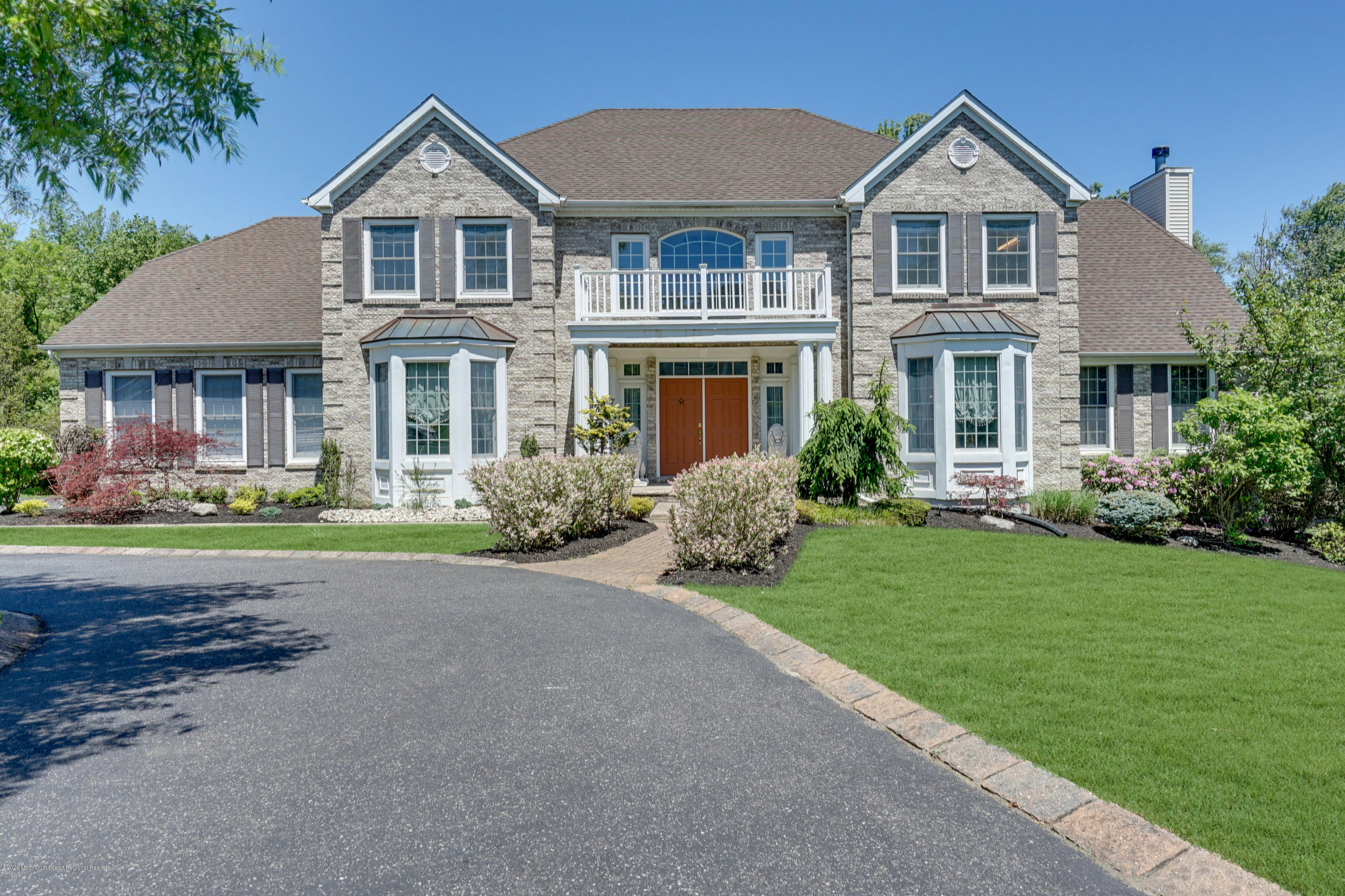 27 Northwoods Road Asbury Park, NJ 07712 - Photo 76 of 76 a front view of house with yard and green space