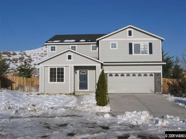 2570 Rio Rico Court Reno, NV 89523 - Photo 1 of 9 a front view of a house with a yard