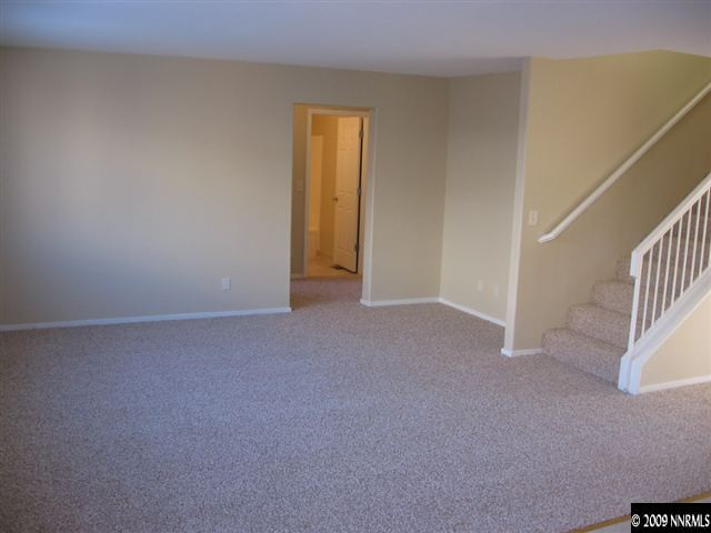 2570 Rio Rico Court Reno, NV 89523 - Photo 5 of 9 a view of an empty room and a window