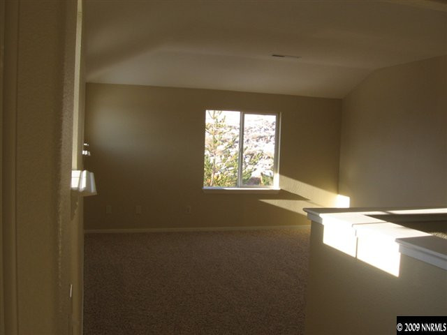 2570 Rio Rico Court Reno, NV 89523 - Photo 6 of 9 a view of an empty room and window