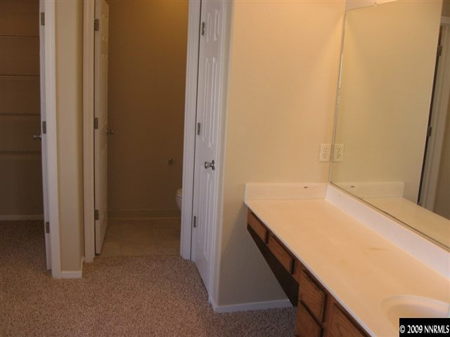 2570 Rio Rico Court Reno, NV 89523 - Photo 8 of 9 a bathroom with a sink and vanity