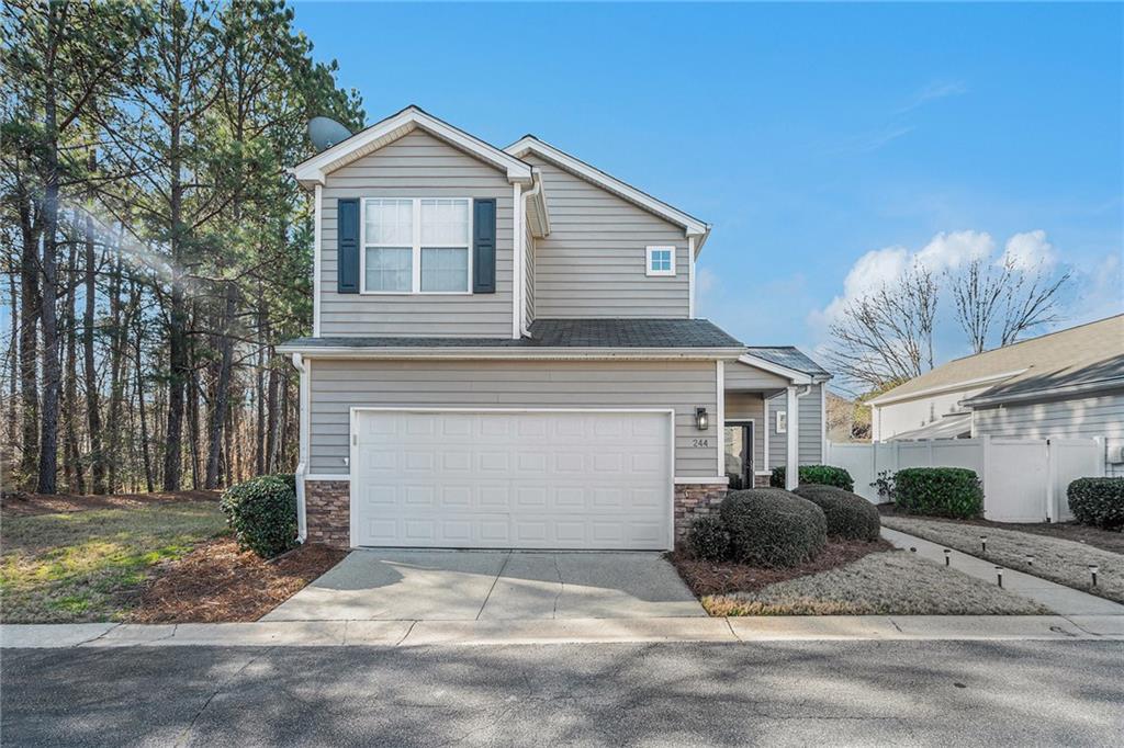 244 Windcroft Circle Northwest Acworth, GA 30101 - Photo 2 of 18 a view of a white house