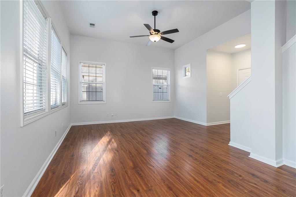244 Windcroft Circle Northwest Acworth, GA 30101 - Photo 5 of 18 a view of an empty room with wooden floor and a window