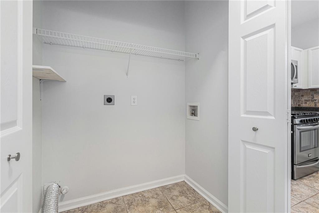 244 Windcroft Circle Northwest Acworth, GA 30101 - Photo 10 of 18 a view of small space with racks on the wall