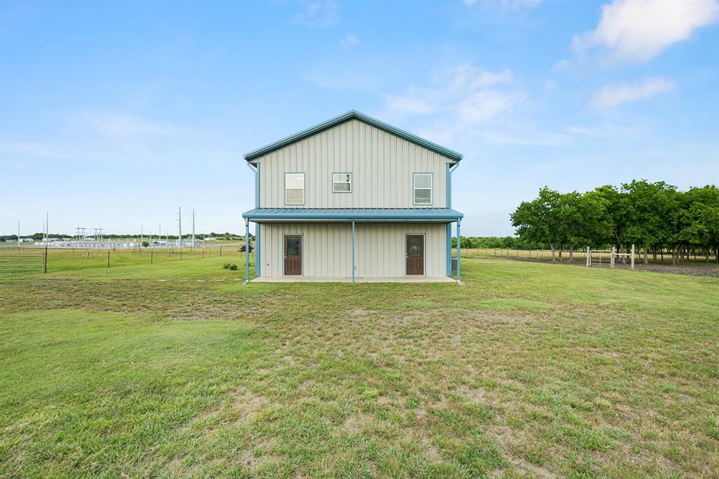 124 County Road 4511 Decatur, TX 76234 - Photo 31 of 39 a view of a house with a yard