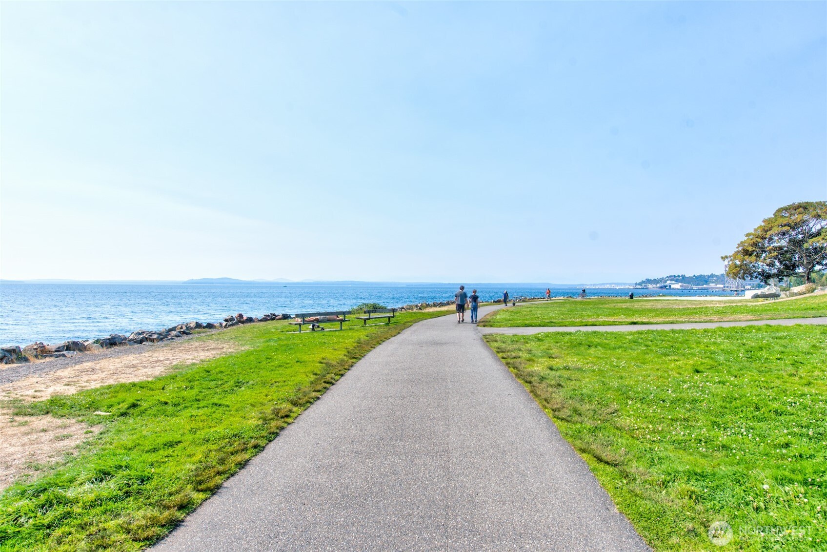500 West Olympic Place, Unit 203 Seattle, WA 98119 - Photo 30 of 35 a view of a lake with a big yard
