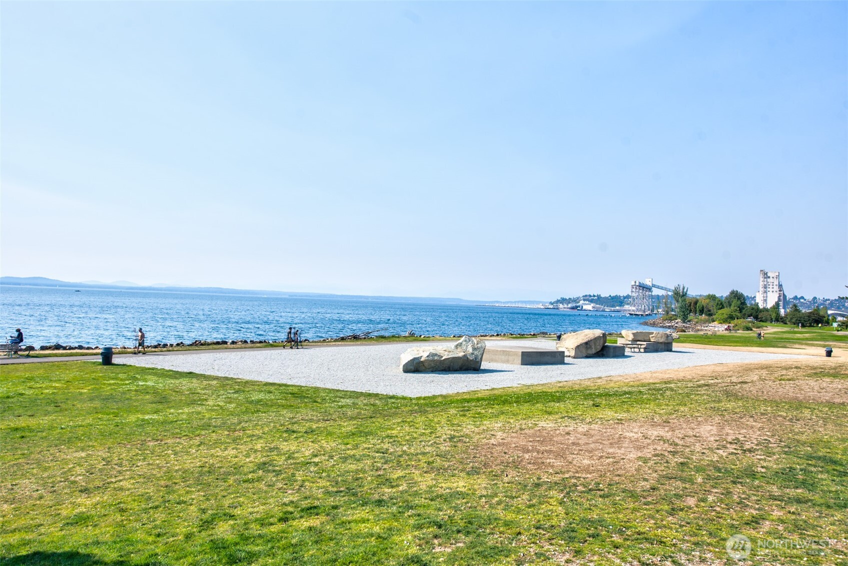 500 West Olympic Place, Unit 203 Seattle, WA 98119 - Photo 31 of 35 a view of a swimming pool and an ocean view