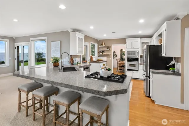 a front view of a house with garden view