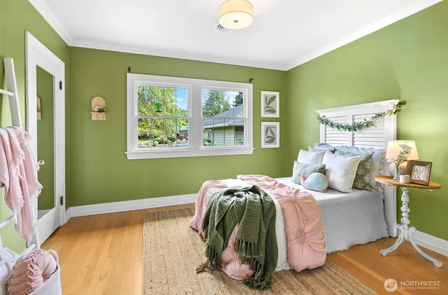 a spacious bathroom with a granite countertop sink and a mirror